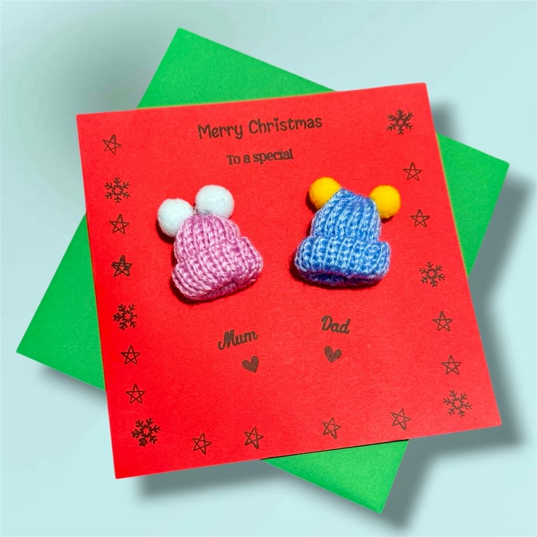 Fun Christmas card for a special mum and dad with cute Pom Pom bobble hats