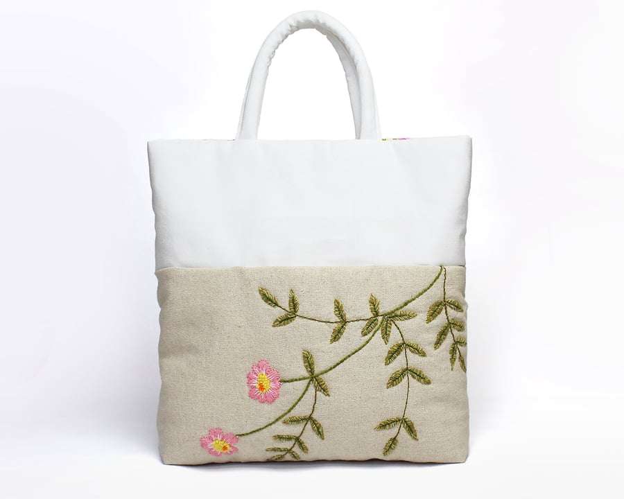 Oatmeal and white bag with front pocket and hand stitched dog rose