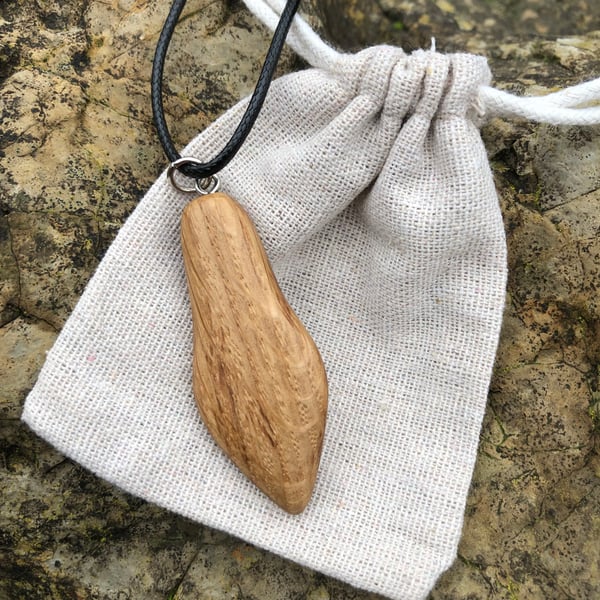 Boho chic hand carved oak wood pendant 