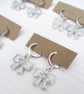 Silver Glitter bow earrings, stud or huggie hoops - Image 1