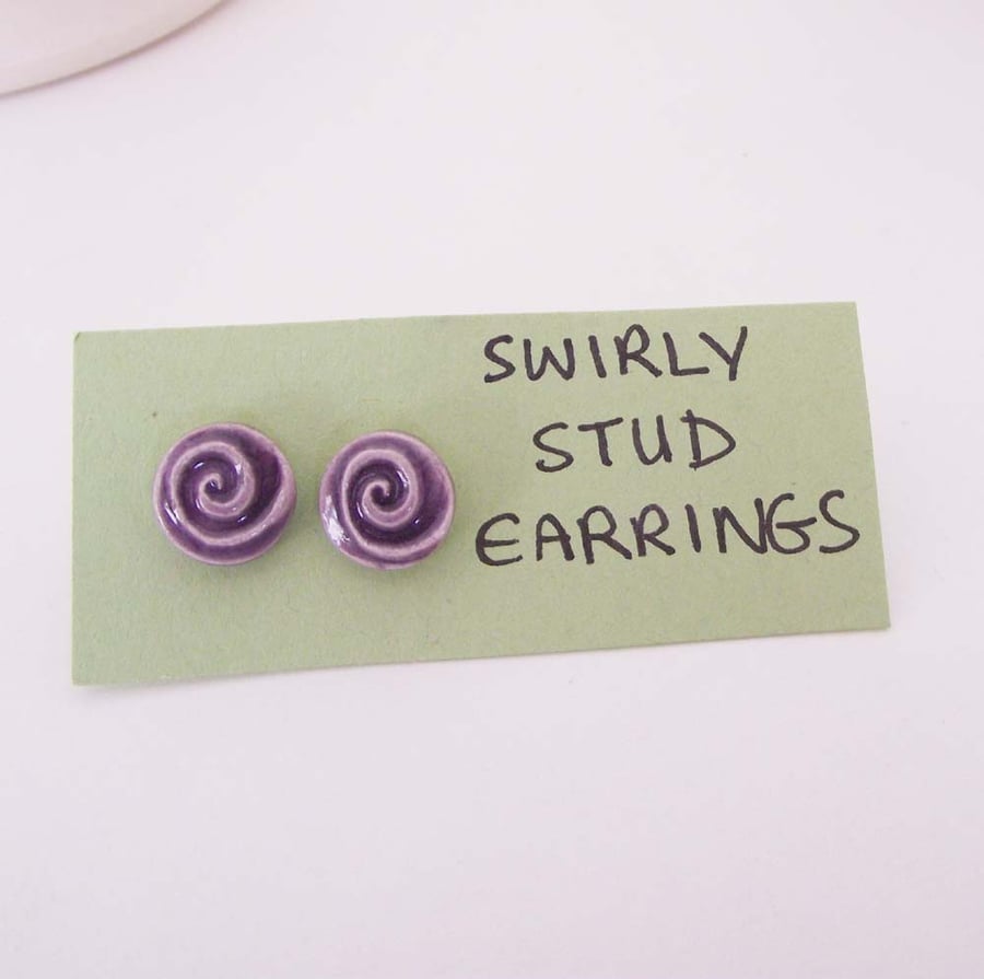 Tiny, swirly ceramic stud earrings
