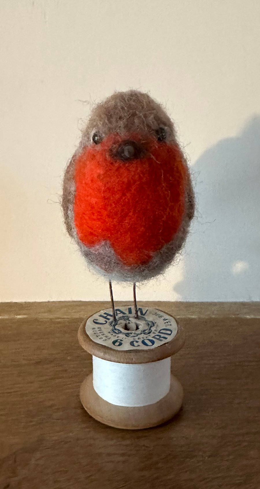 Robin on a bobbin