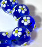 Handmade blue and white daisy patterned lamp work glass beads - Image 4