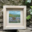 Spring gate with daffodils: mixed media