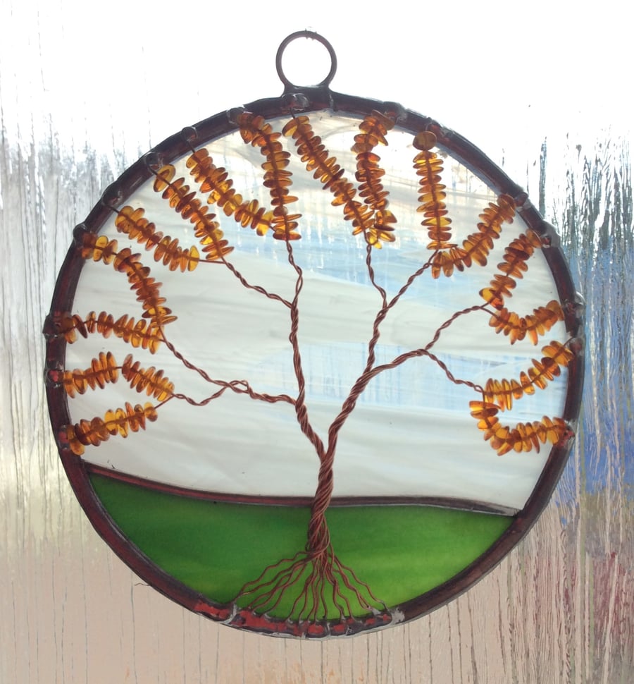 Amber on stained glass tree of life (0352)