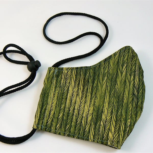 Face mask with removable nose wire , filter pocket  and drawstring toggle