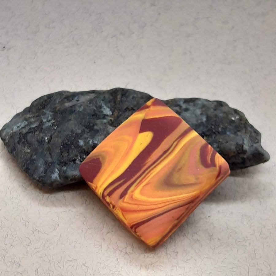 Striking polymer clay brooch