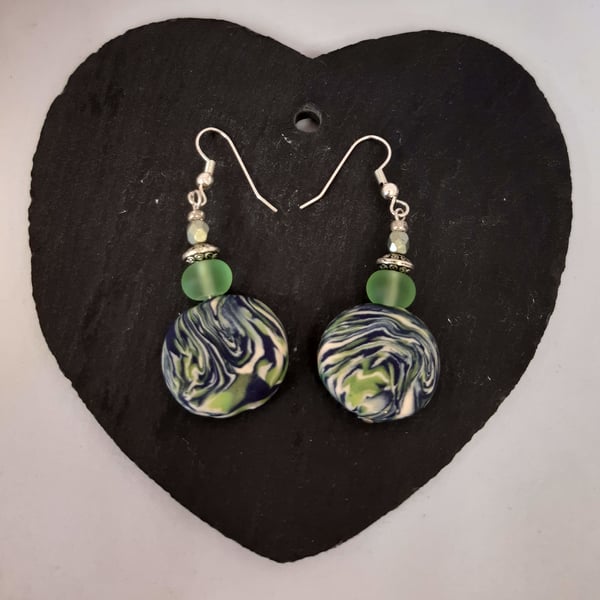 Disc shaped polymer clay earrings