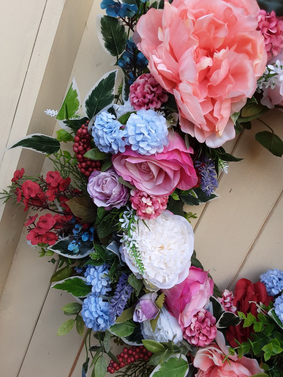 Paradise.  Large wreath  door wall table grave weddings. 