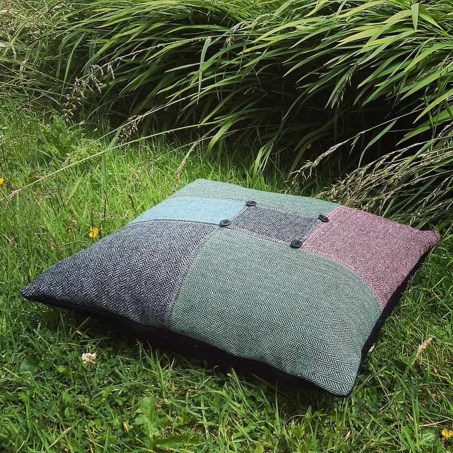   A large statement floor cushion, made from tactile wool.   With feather pad.