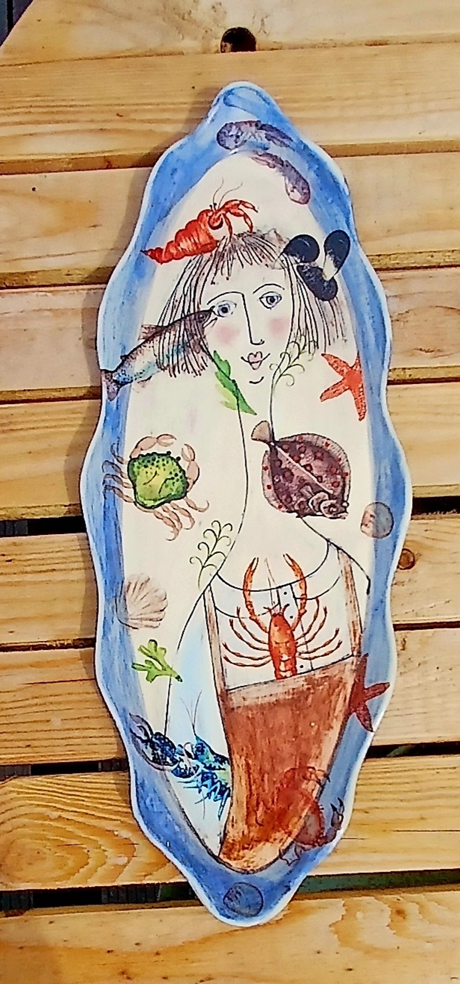 Lady with the fish.Wall art.