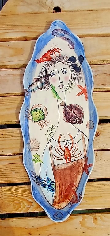 Lady with the fish.Wall art.
