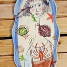 Lady with the fish.Wall art.