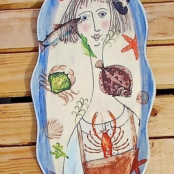 Lady with the fish.Wall art.