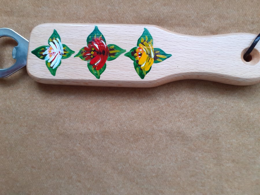 Wooden handled bottle opener with canal art style roses