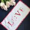 Floral 'Love' fabric banner