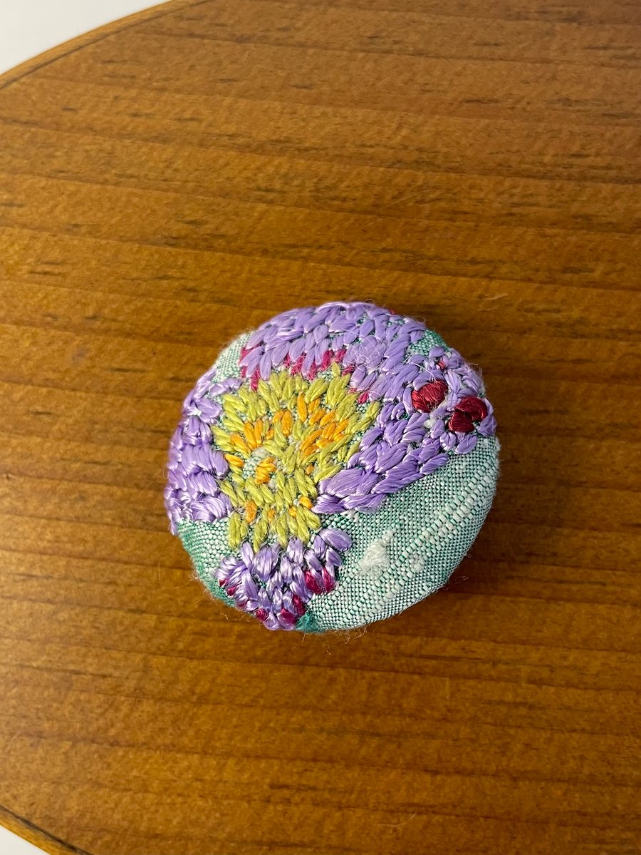 Hand embroidered button 
