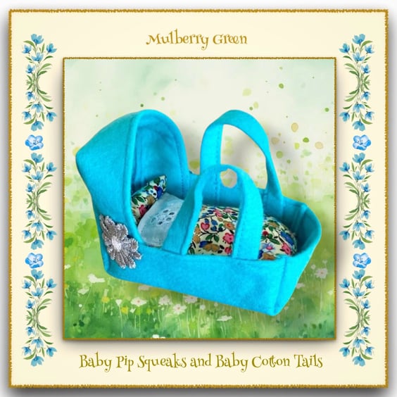 A Pretty Turquoise Felt Cradle for the baby Pip Squeaks and Cotton Tails