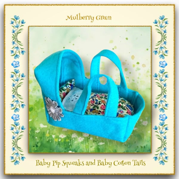 A Pretty Turquoise Felt Cradle for the baby Pip Squeaks and Cotton Tails