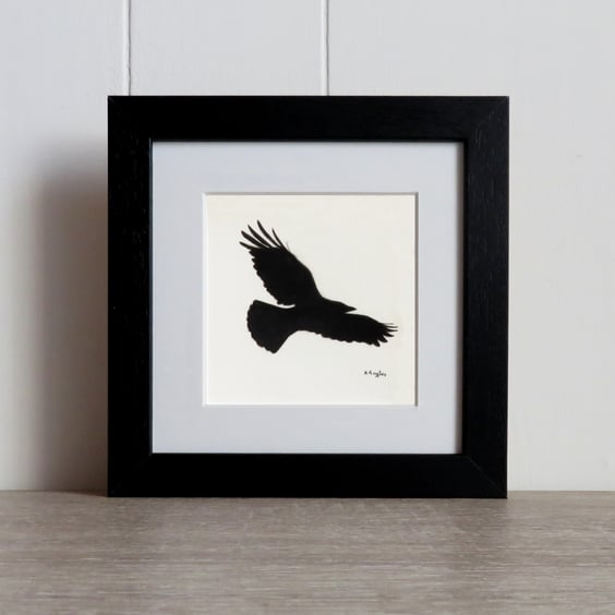 Courting Crow 2, original charcoal pencil drawing of a flying crow, framed.