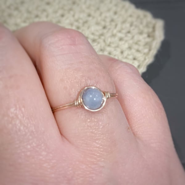 Aquamarine gemstone ring in rose gold coloured wire