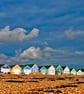 Hengistbury Head Beach Huts Dorset Coast Photograph Print - Image 1