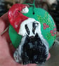 Christmas tree decoration of a Badger with a santa hat made from air dry clay.   - Image 3