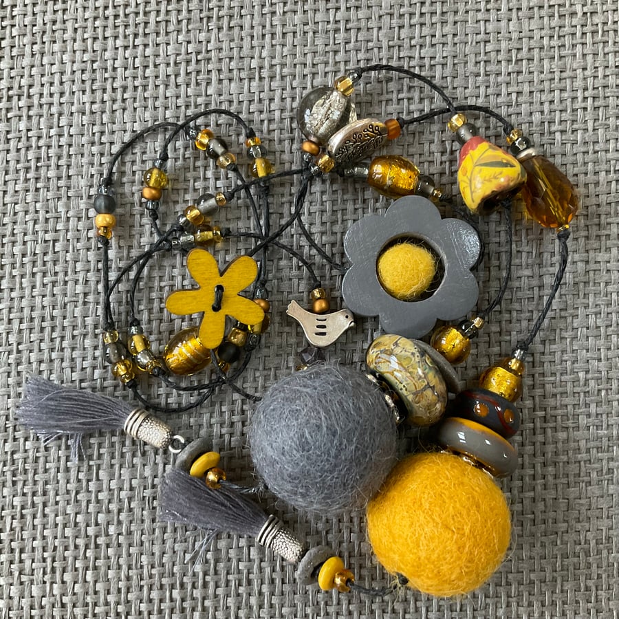 “Silver and Gold” lariat necklace