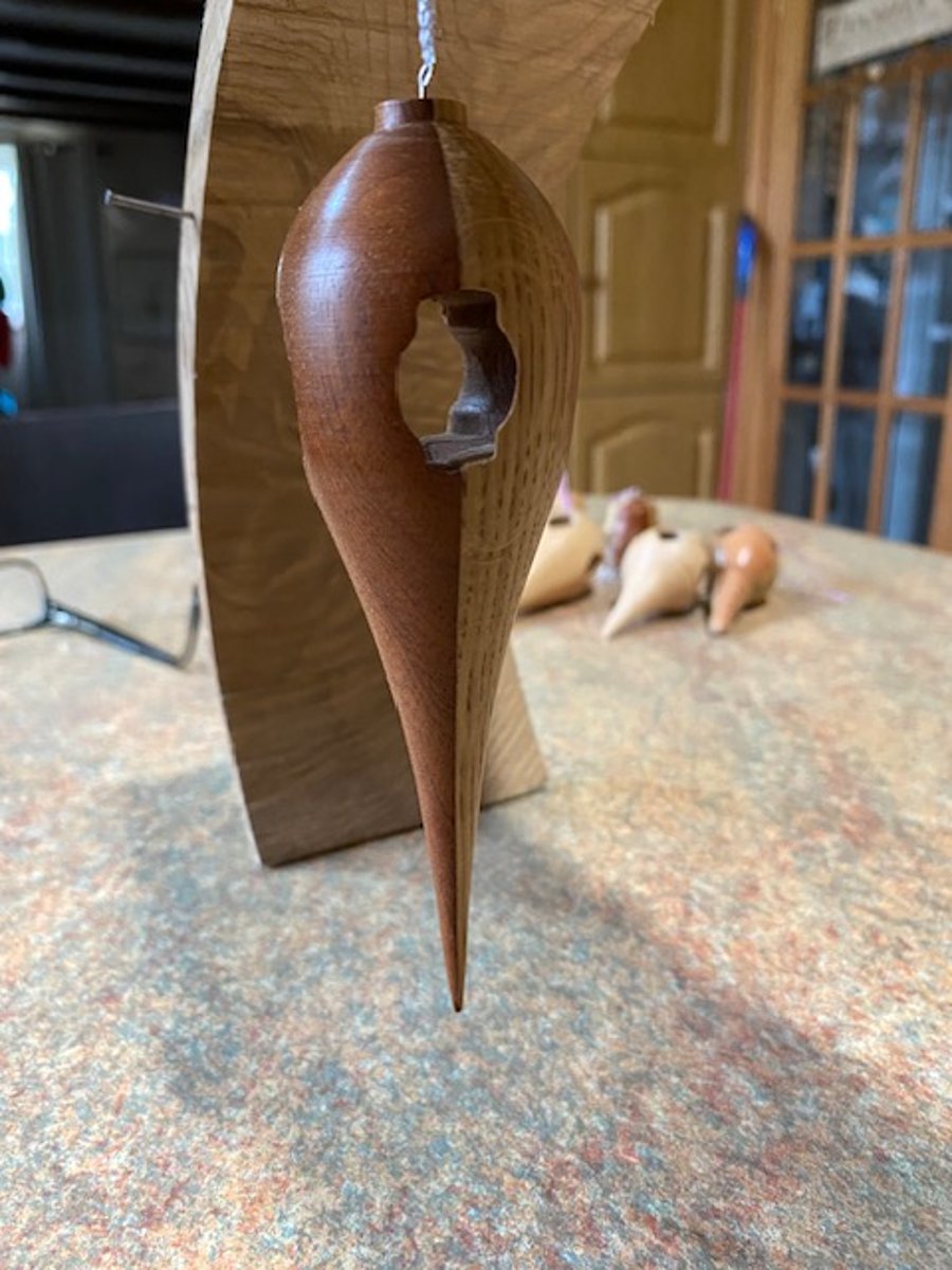 Long Oak and Sapele wood Christmas tree decoration.