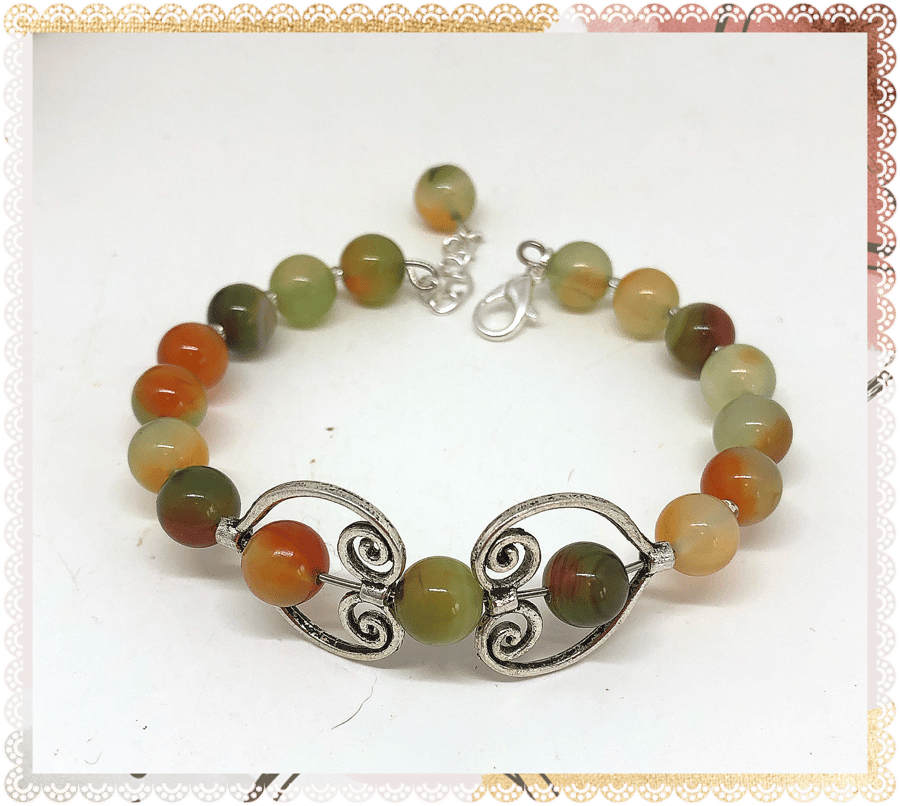 One of a kind  Stylish Fidget heart bangle style bracelet Peacock gemstone