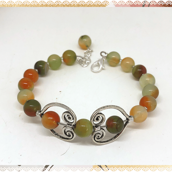 One of a kind  Stylish Fidget heart bangle style bracelet Peacock gemstone