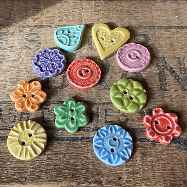 Set of 11 small handmade ceramic buttons yellow heart