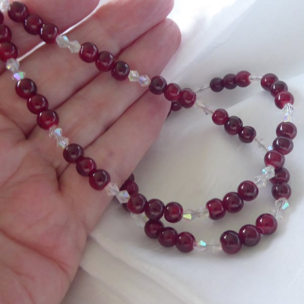 Add some sparkle to winter with this beautiful handmade Cranberry Ice Necklace