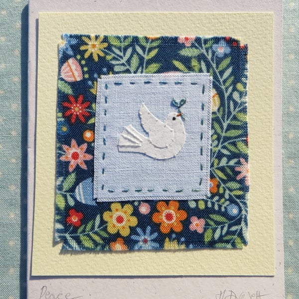 Peace hand-stitched card with beautiful background fabric delicate detailed work