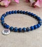 Blue sea sediment jasper stretch bracelet with North Star charm - Image 6