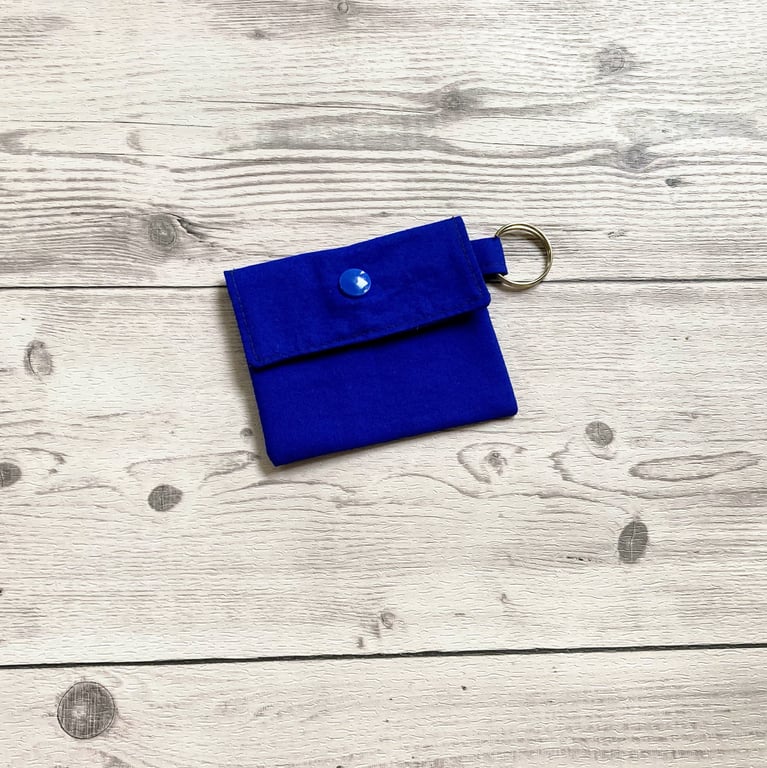 Plain royal blue colour round lip balm keyring, keychain. Lipstick holder.