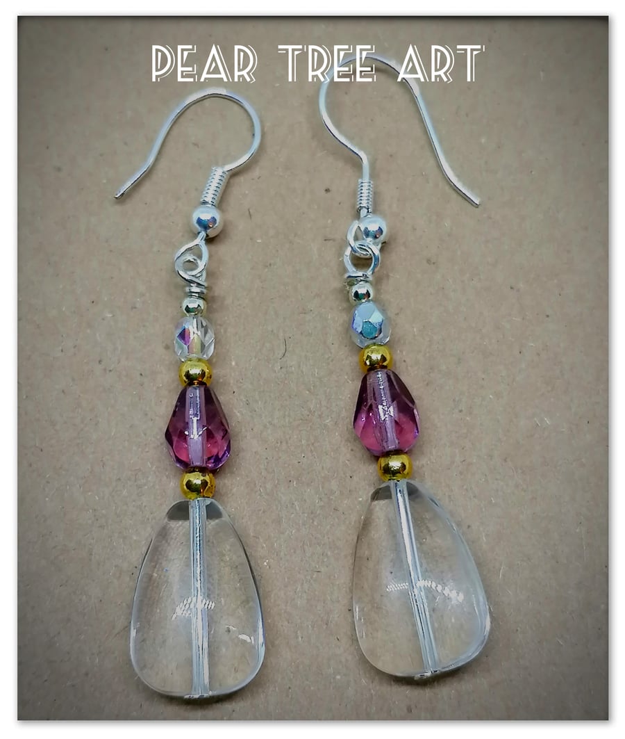 Glass drop earrings with purple crystal beads on Silver  plated hooks.