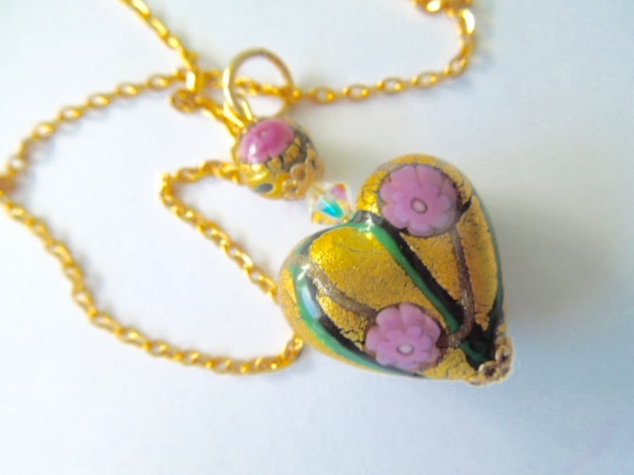 Murano glass gold and pink pendant with Swarovski crystal and gold chain.