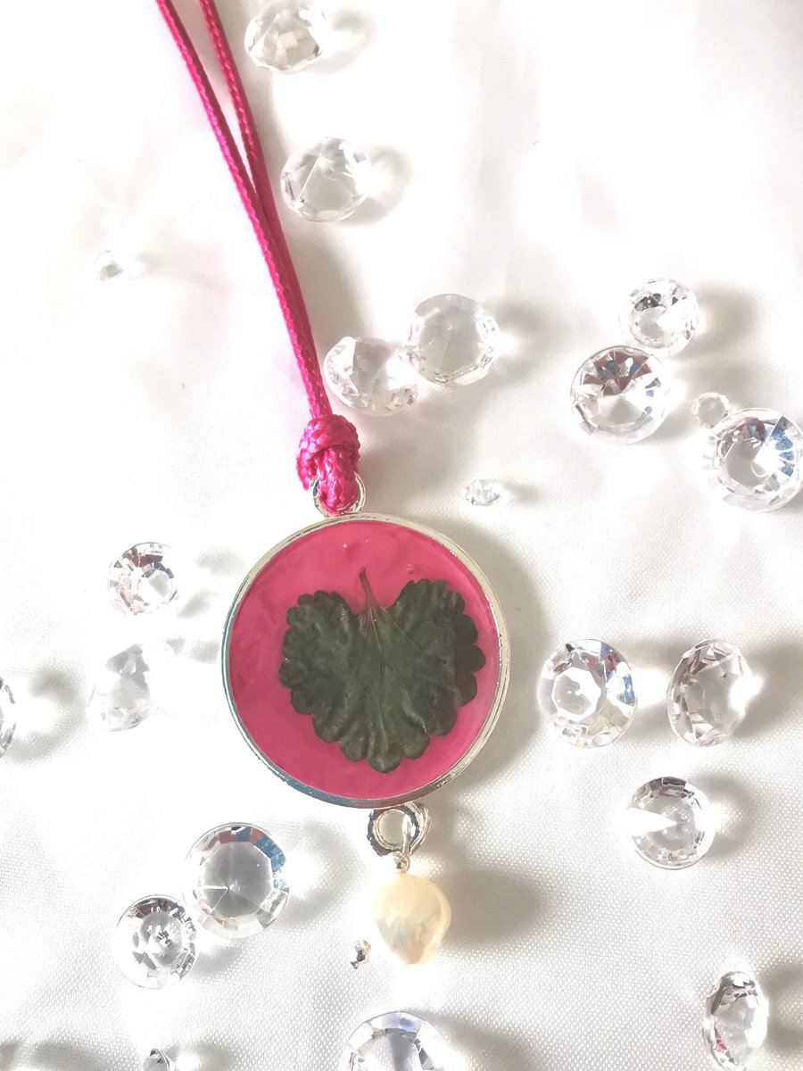 Round Resin Pendant With Leaf