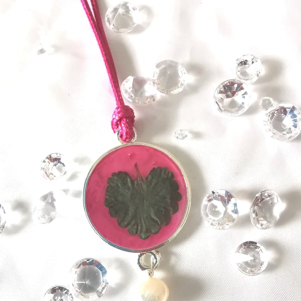 Round Resin Pendant With Leaf