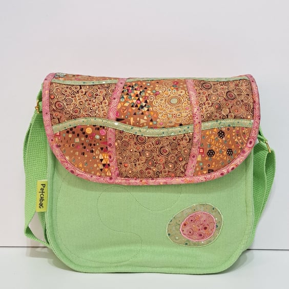 Big corduroy handbag with golden, pink and brown abstract pattern 