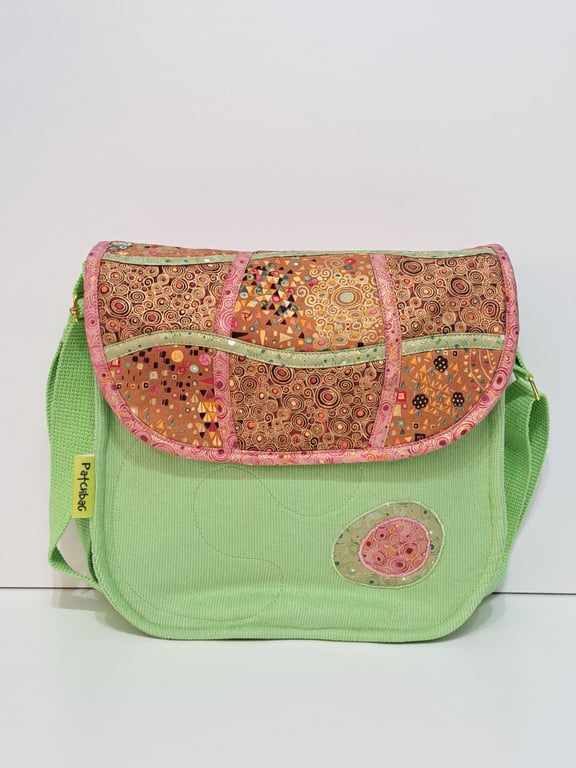 Big corduroy handbag with golden, pink and brown abstract pattern 