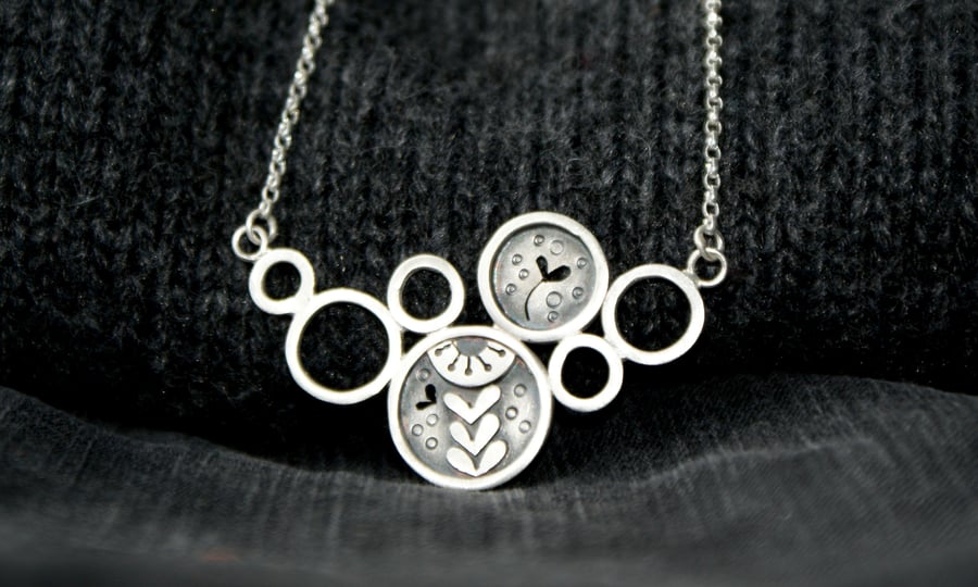 SALE 25% OFF Silver seed head circles bib necklace