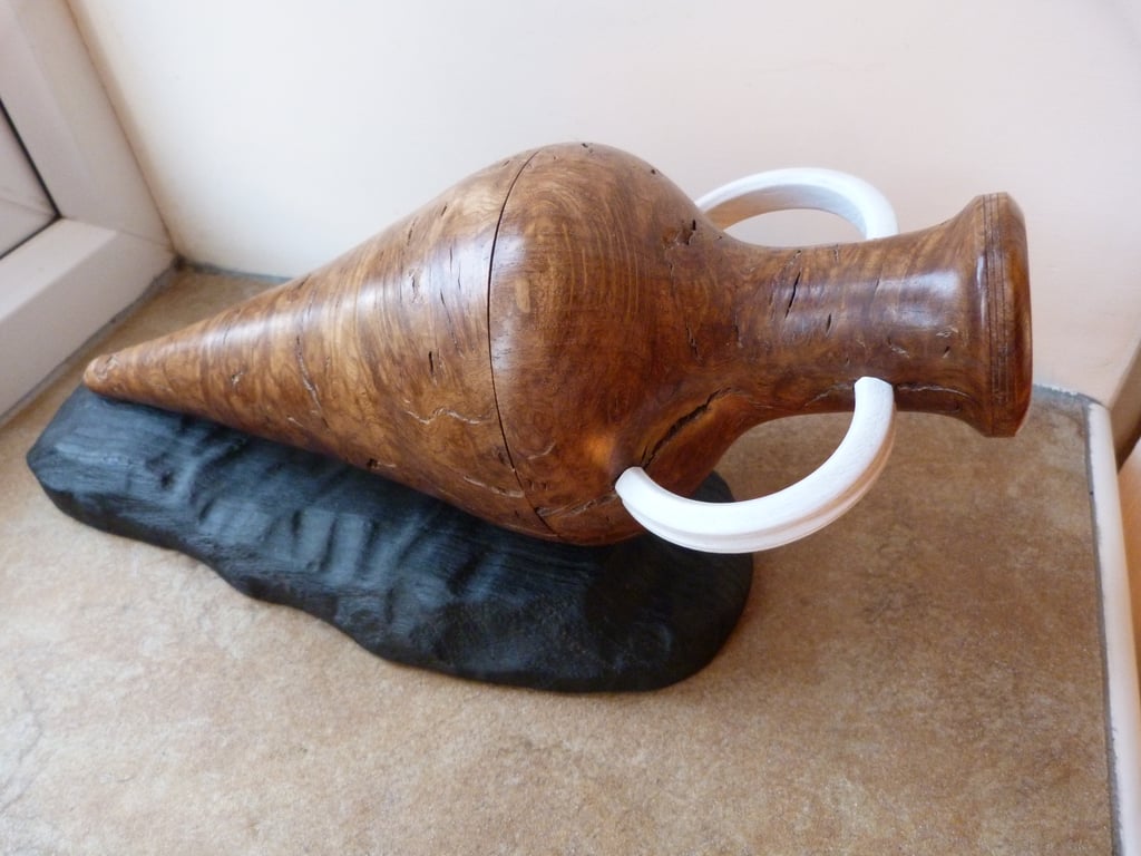 Wooden amphora shaped box-lidded container