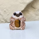 Hand painted polymer clay tigereye sloth totem sculpture