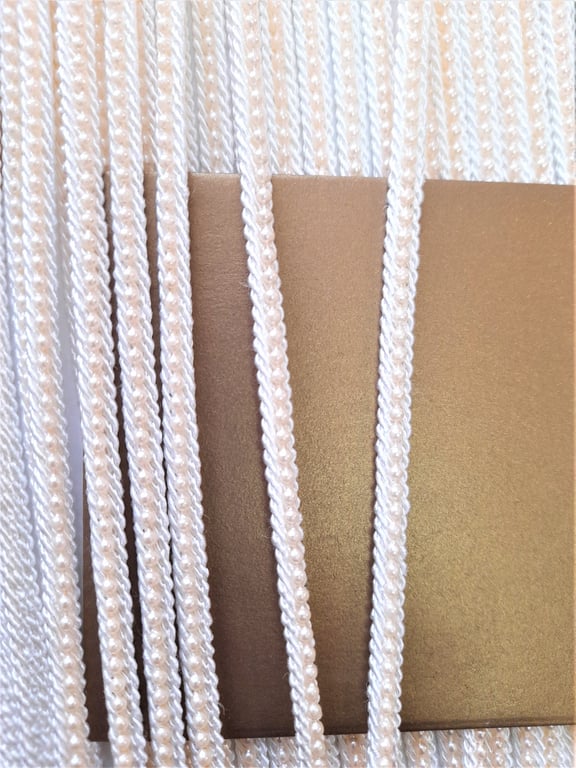 White and cream beaded trim braid, 3 metres