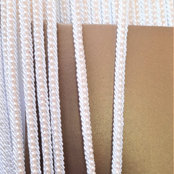 White and cream beaded trim braid, 3 metres
