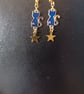 Celestial dark blue and gold cat and star dangle earrings (sun pattern) - Image 2