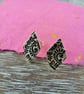 Silver tulip pattern ear studs - Image 2