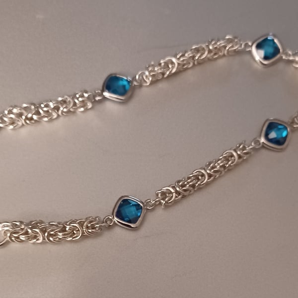 Byzantine chainmaille and blue cubic zirconia bracelet